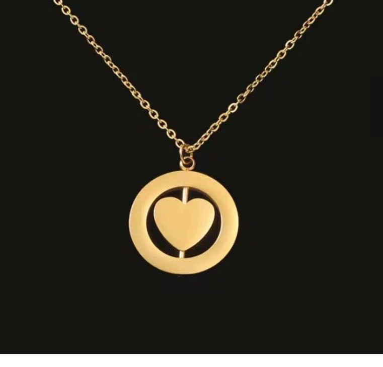 Rotating heart in circle pendant in gold or silver on chain necklace engravable