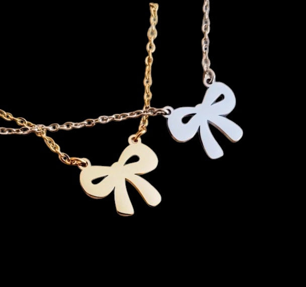 bow-shaped pendants on gold or silver chains engravable
